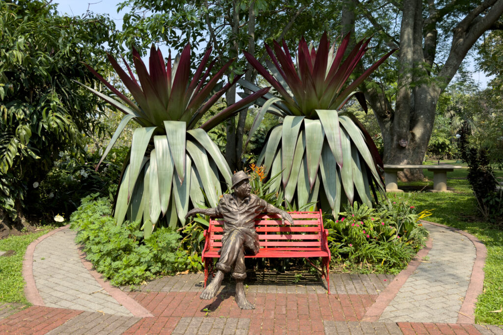 The wonderful gardens of the Bougainvillea Hotel are filled with art and tropical plants (image by Inger Vandyke)