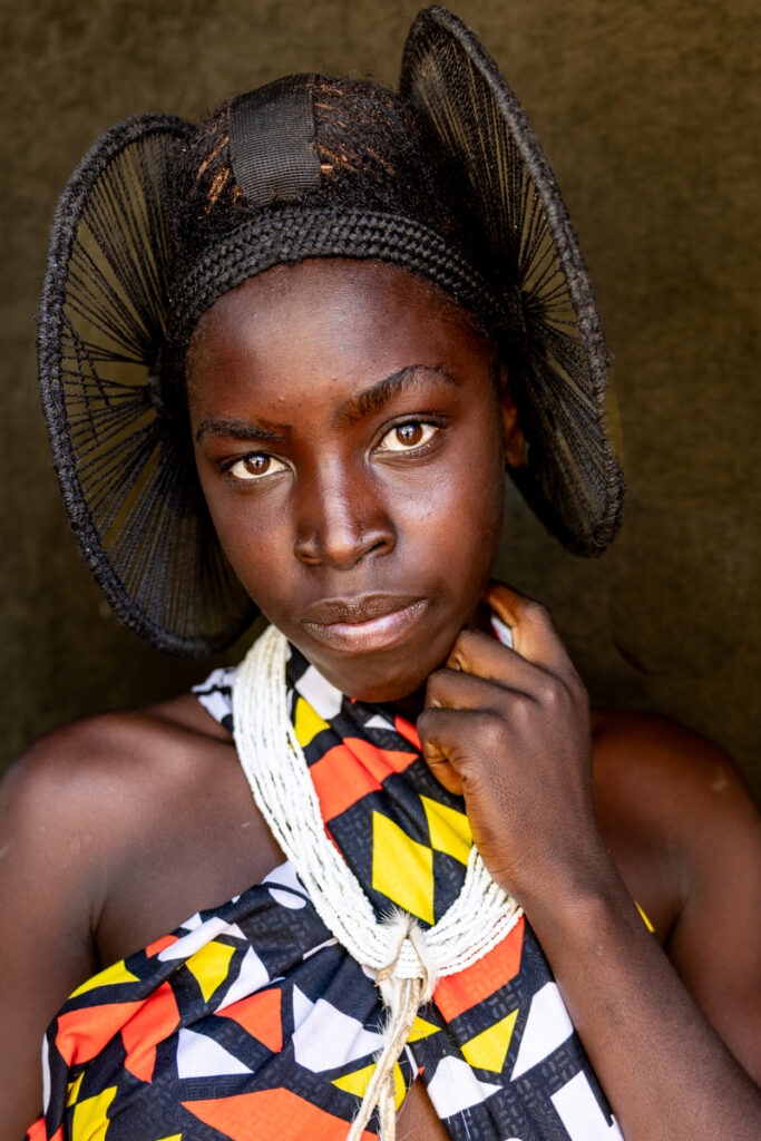 An Ovahumbi woman showcasing her distinctive and intricate hairstyle affectionately known as ‘ elephant’ ears (image by Ingrid Koedood)