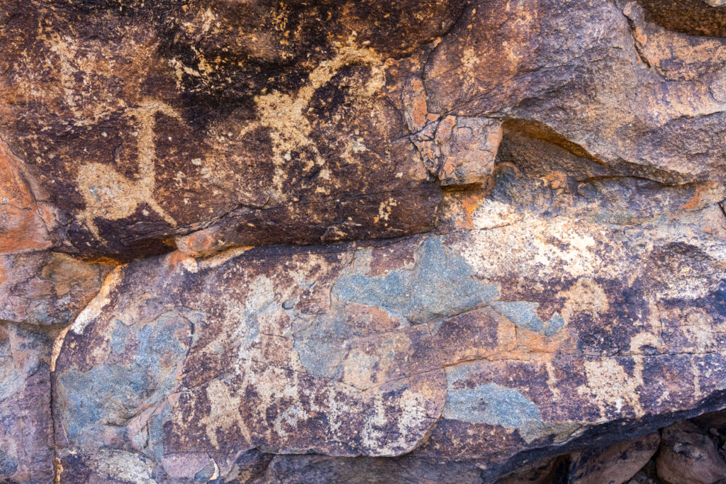 Ancient giraffe petroglyphs near Lake Turkana. The Turkana hold giraffes sacred, believing their lofty heads tickle the clouds to make them rain (image by Inger Vandyke)