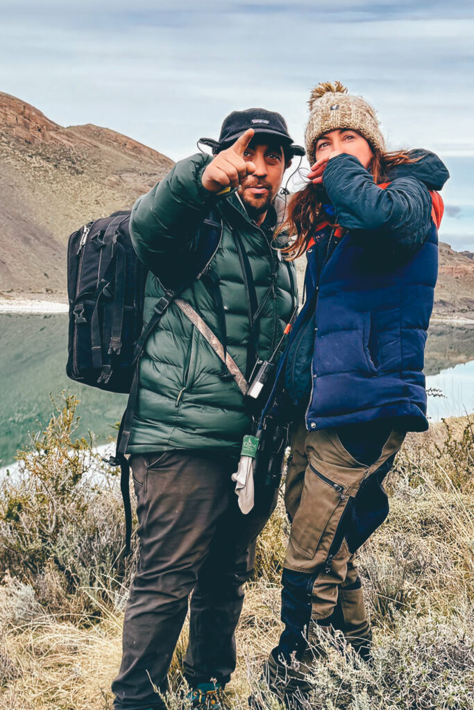 Tour co-guide Mauricio and I plot the best route to get clients up a ridge and close to dominant male puma 'Dark' (image by Gin Wilde)