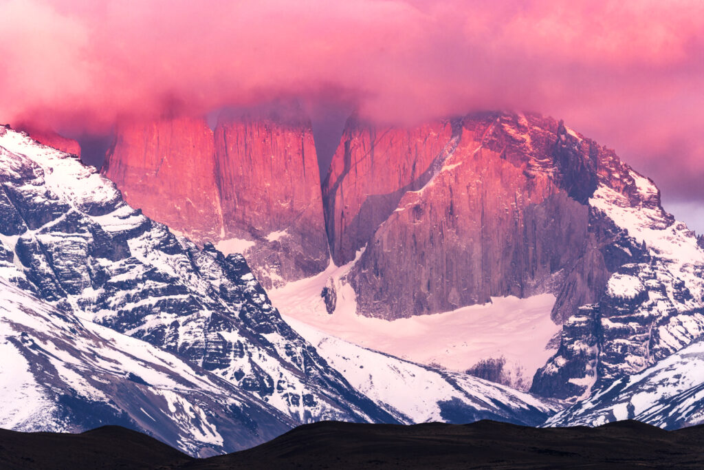 – Torres del Paine sunrise, the pink projection onto the towers only lasts a very short while and is weather dependent, so no available every day (image by Mike Watson)